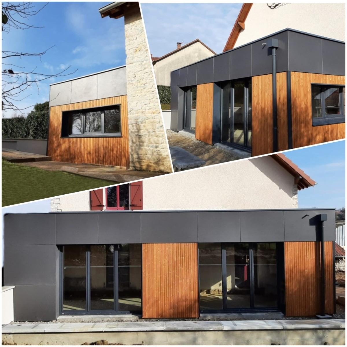 Extension de maison moderne en ossature bois, avec un mélange de bardage bois mélèze ocre et de panneaux Eternit gris, dotée de larges baies vitrées et d'un toit plat.